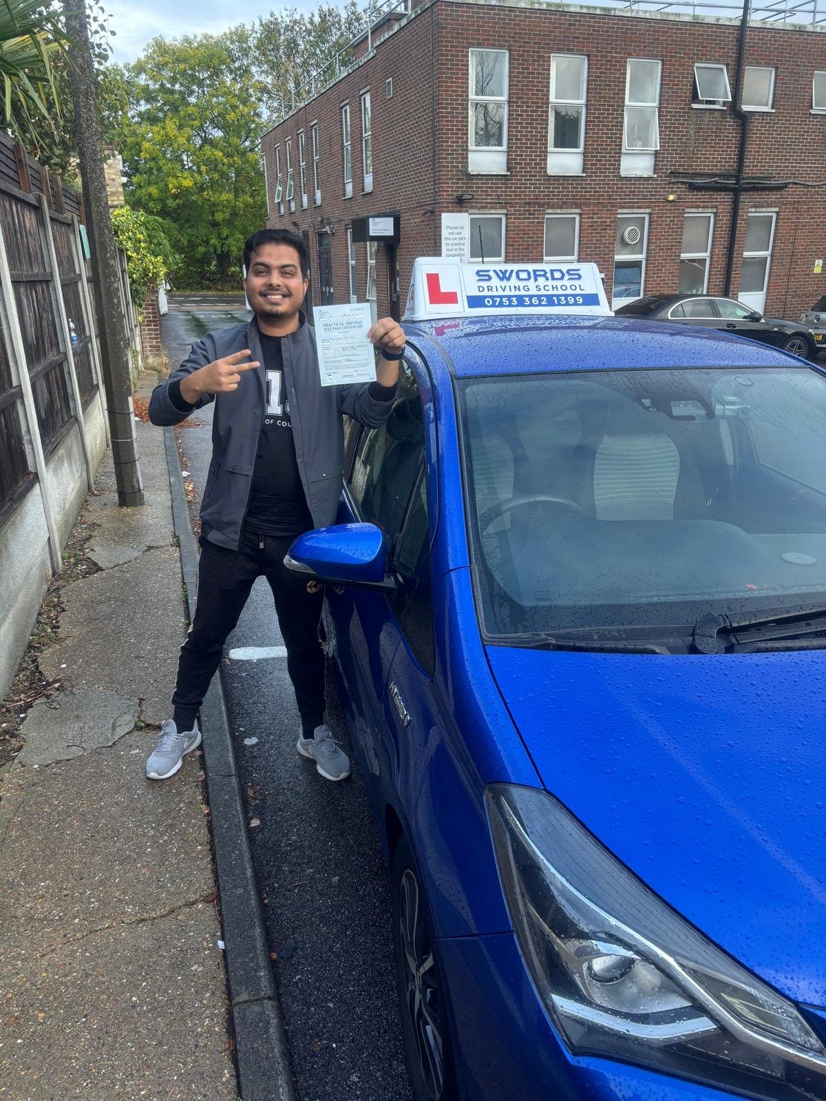Happy student who passed their driving test with Swords Driving School
